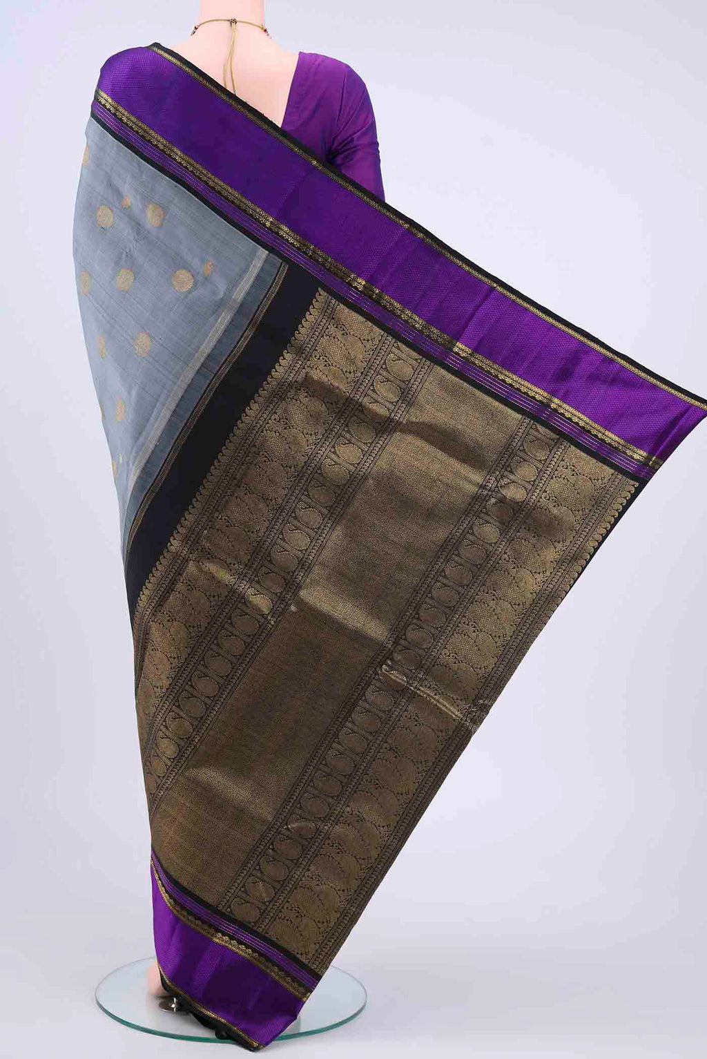 Flat view of Grey Kanchipuram Saree with Jacquard With Zari Butta on the body and Thread Border