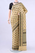 Cream Banarasi Saree with Thread Butta on the body and Thread Border displayed on a mannequin