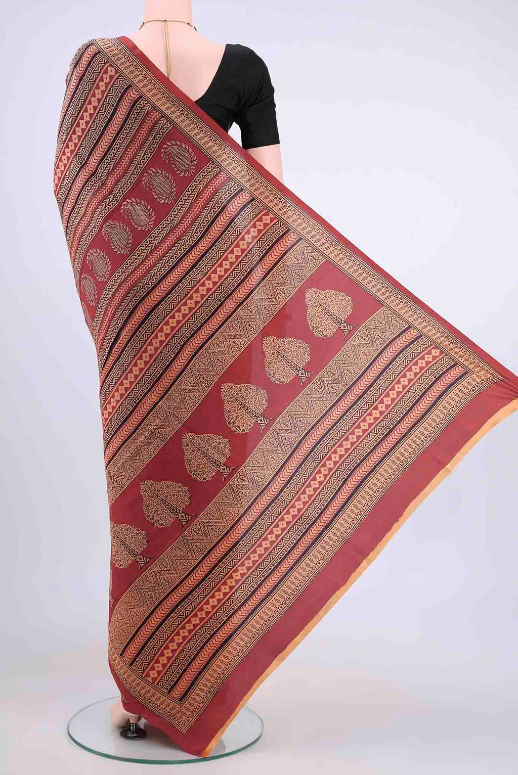Flat view of Cinnamon Printed Silk Saree with Printed design on the body and Thread Border