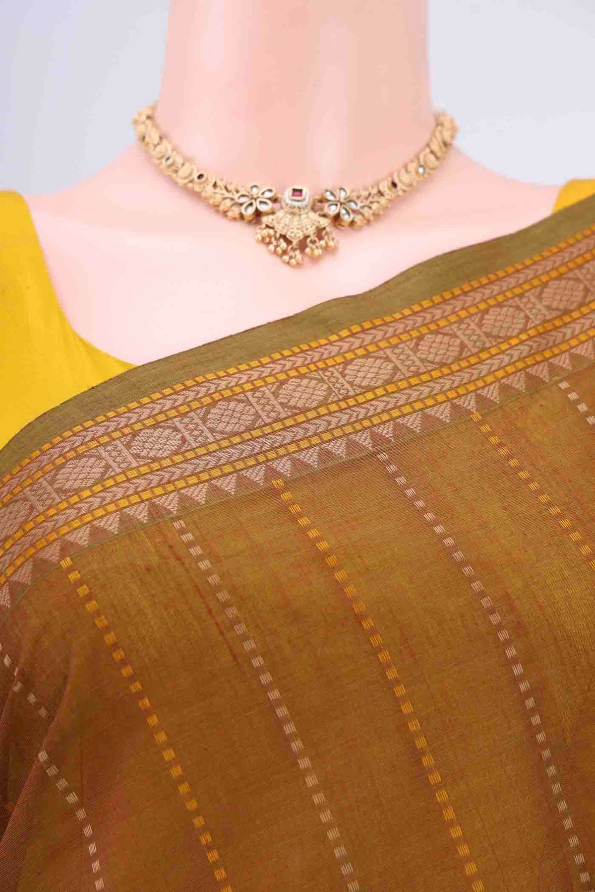 Border image of Mustard Kanchi Cotton Saree with Stripes on the body and Plain Border
