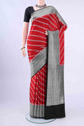Red Banarasi SareeJacquard design on the body and Zari Border displayed on a mannequin