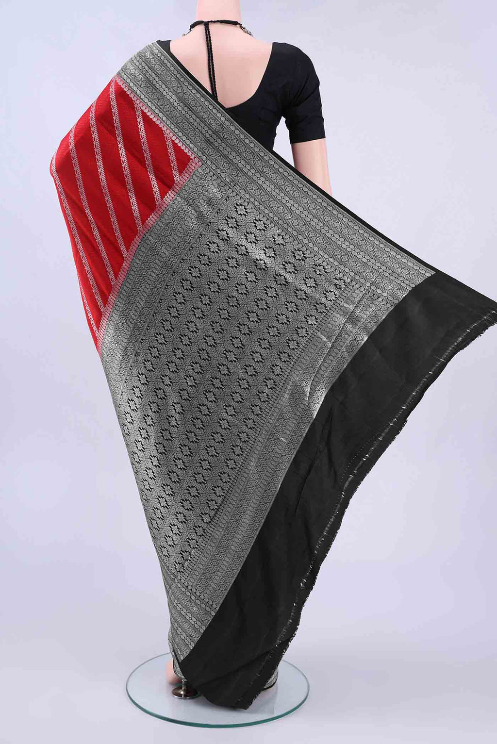 Flat view of Red Banarasi SareeJacquard design on the body and Zari Border