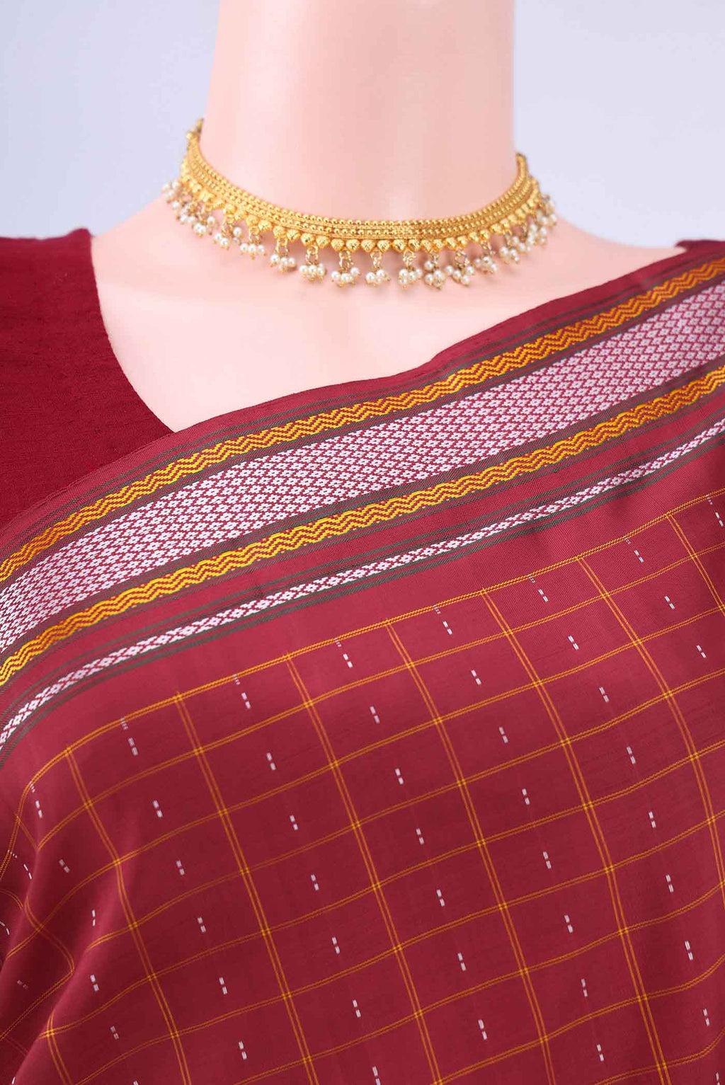 Border image of Red Kanchipuram Saree Checked design on the body and Thread Border