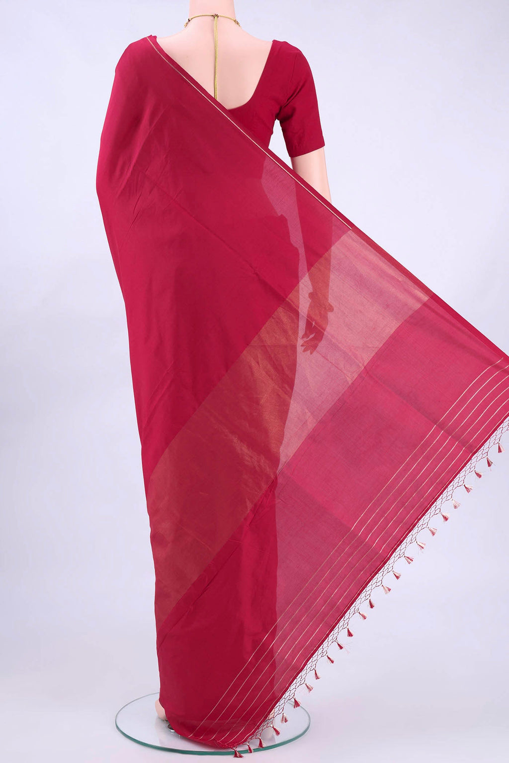 Flat view of Maroon Banarasi Silk Saree with Zari Butta on the body and Zari Border