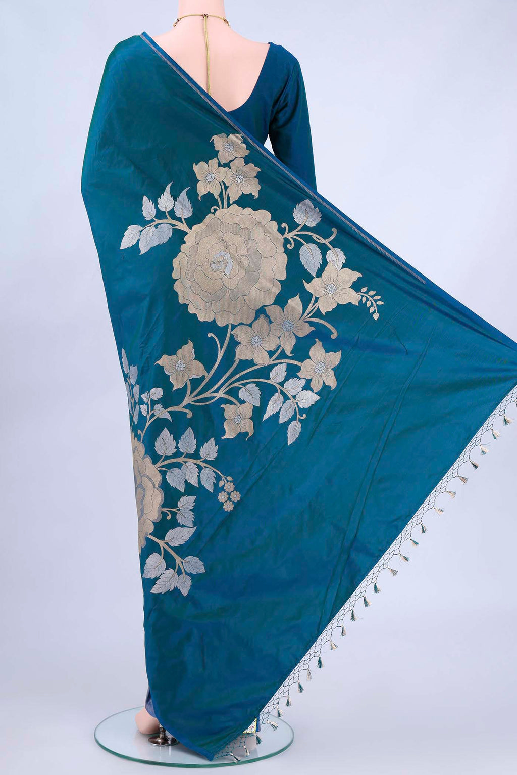 Flat view of Blue Banarasi Silk Saree with Zari Butta on the body and Zari Border