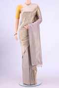 Silver Banarasi Silk Saree with Zari Butta on the body and Zari Border displayed on a mannequin