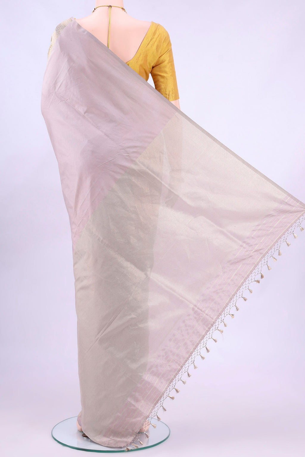 Flat view of Silver Banarasi Silk Saree with Zari Butta on the body and Zari Border