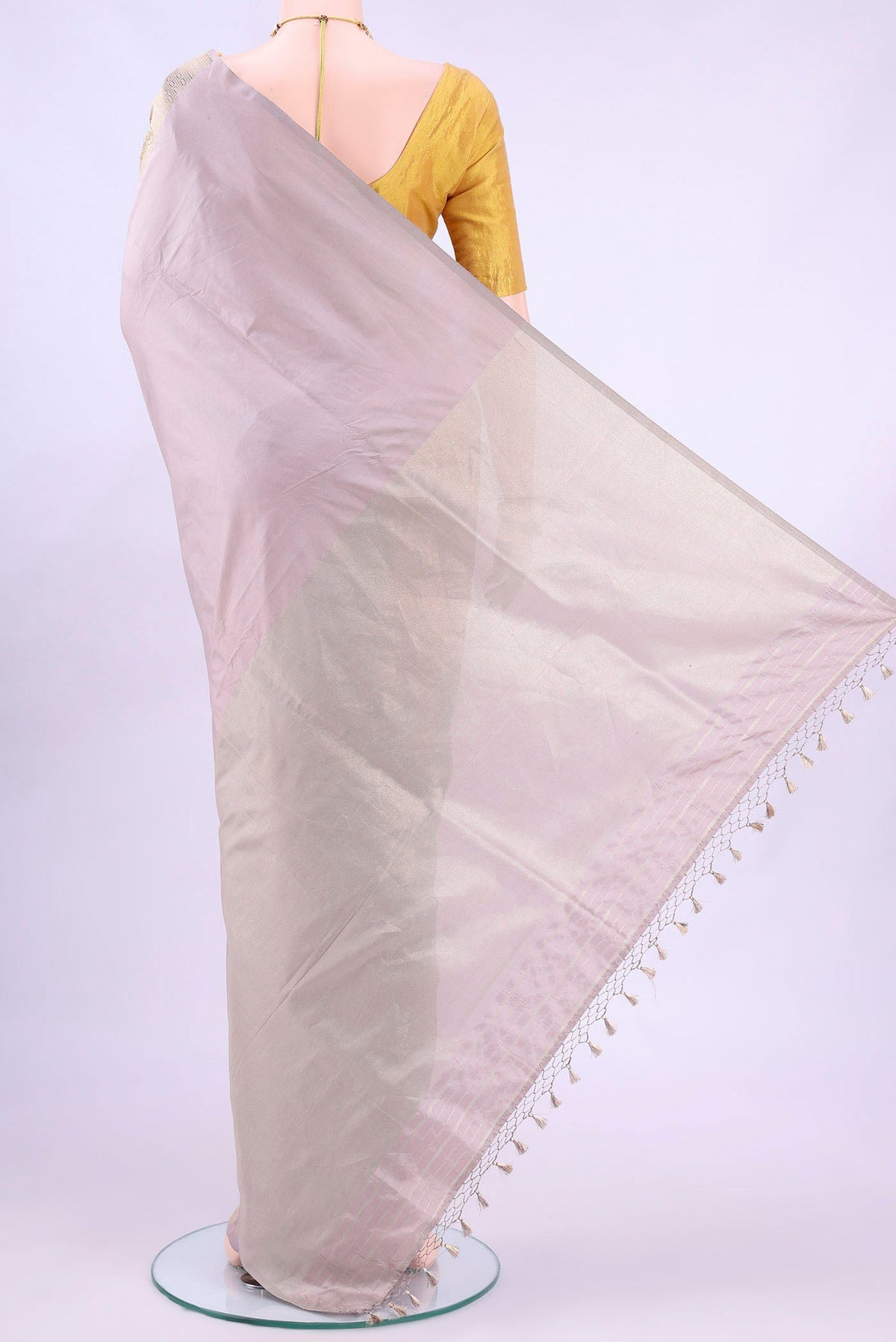 Flat view of Silver Banarasi Silk Saree with Zari Butta on the body and Zari Border