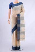 Beige MP Tussar Saree with Plain Body and Plain Border displayed on a mannequin