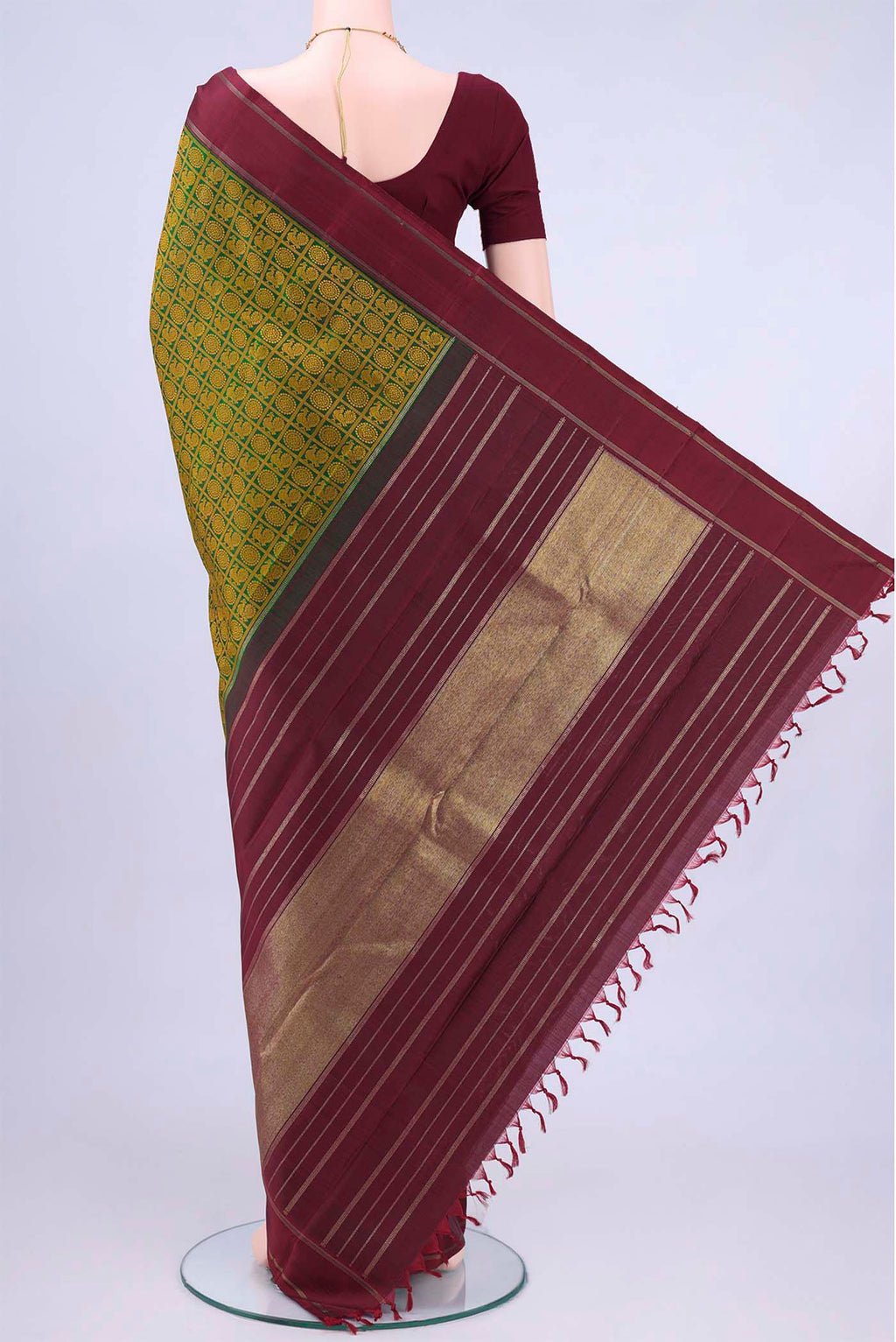 Flat view of Bottle Green Kanchipuram Saree with Jacquard design on the body and Thin Zari Line