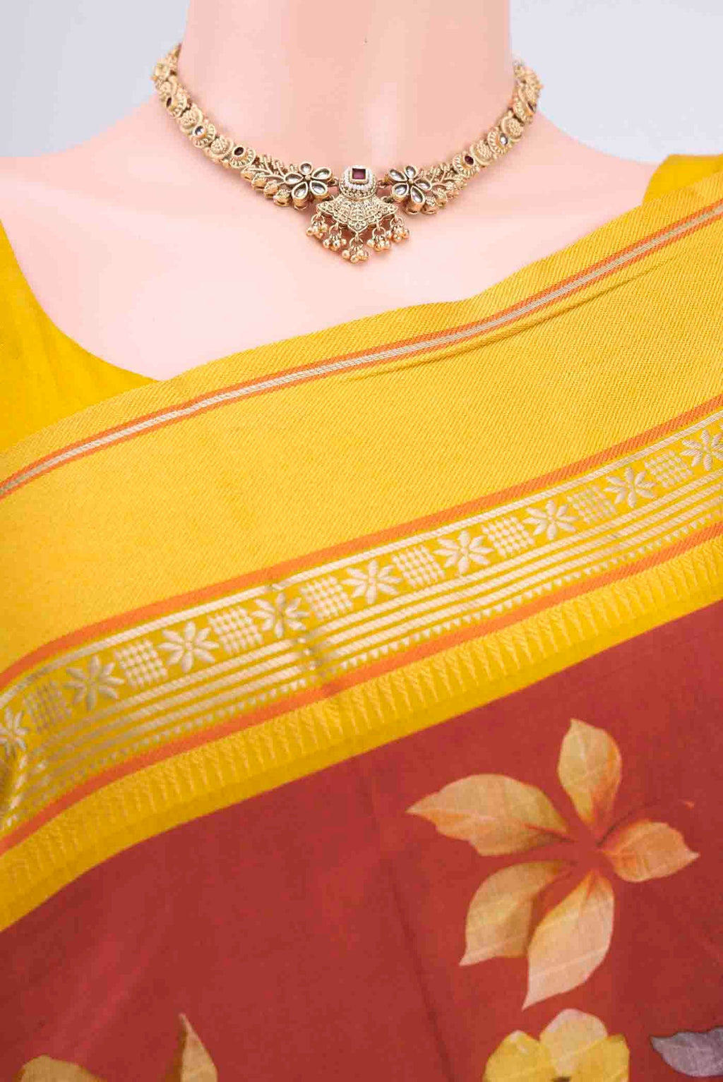 Border image of Maroon Chanderi Silk Cotton Saree with Floral Print on the body and Zari Border
