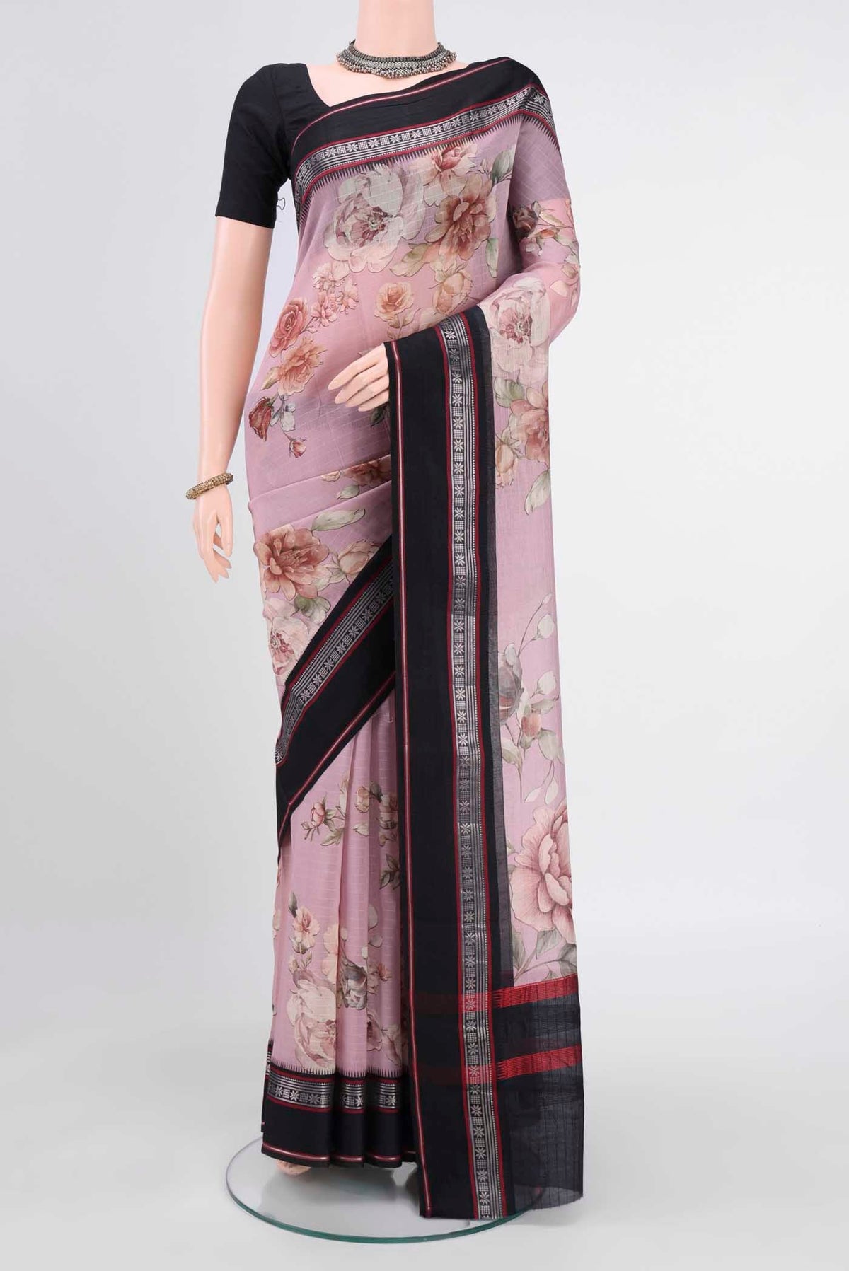 Mauve Chanderi Silk Cotton Saree with Floral Print on the body and Zari Border displayed on a mannequin