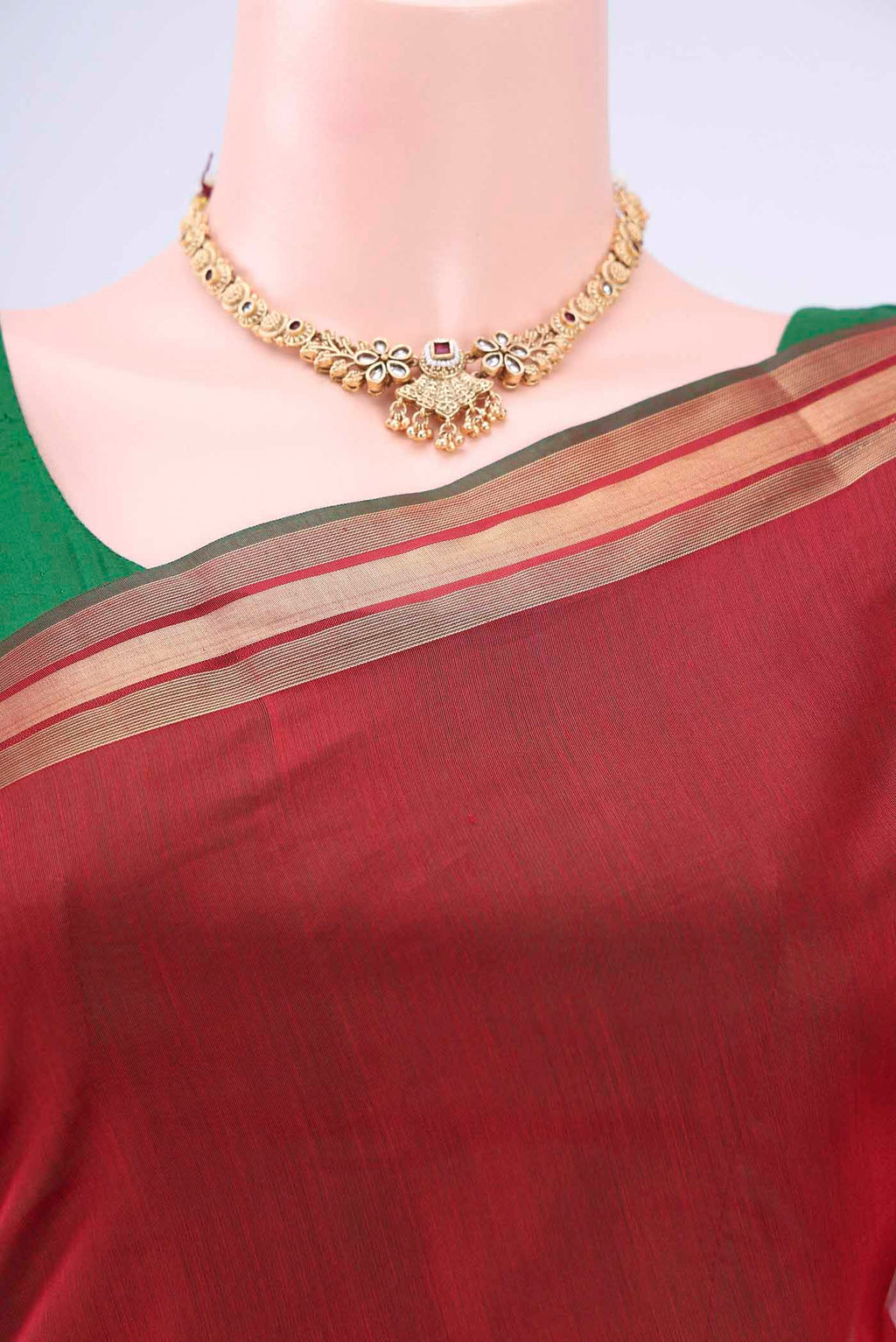 Border image of Red Kora Cotton Saree with Zari Butta on the body and Zari Border