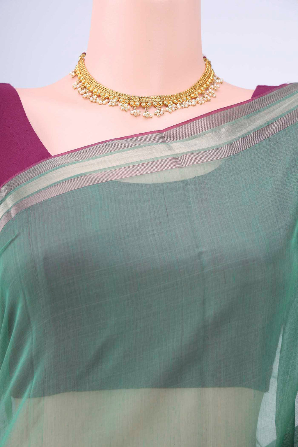 Border image of Sage Green Kora Cotton Saree with Zari Butta on the body and Zari Border