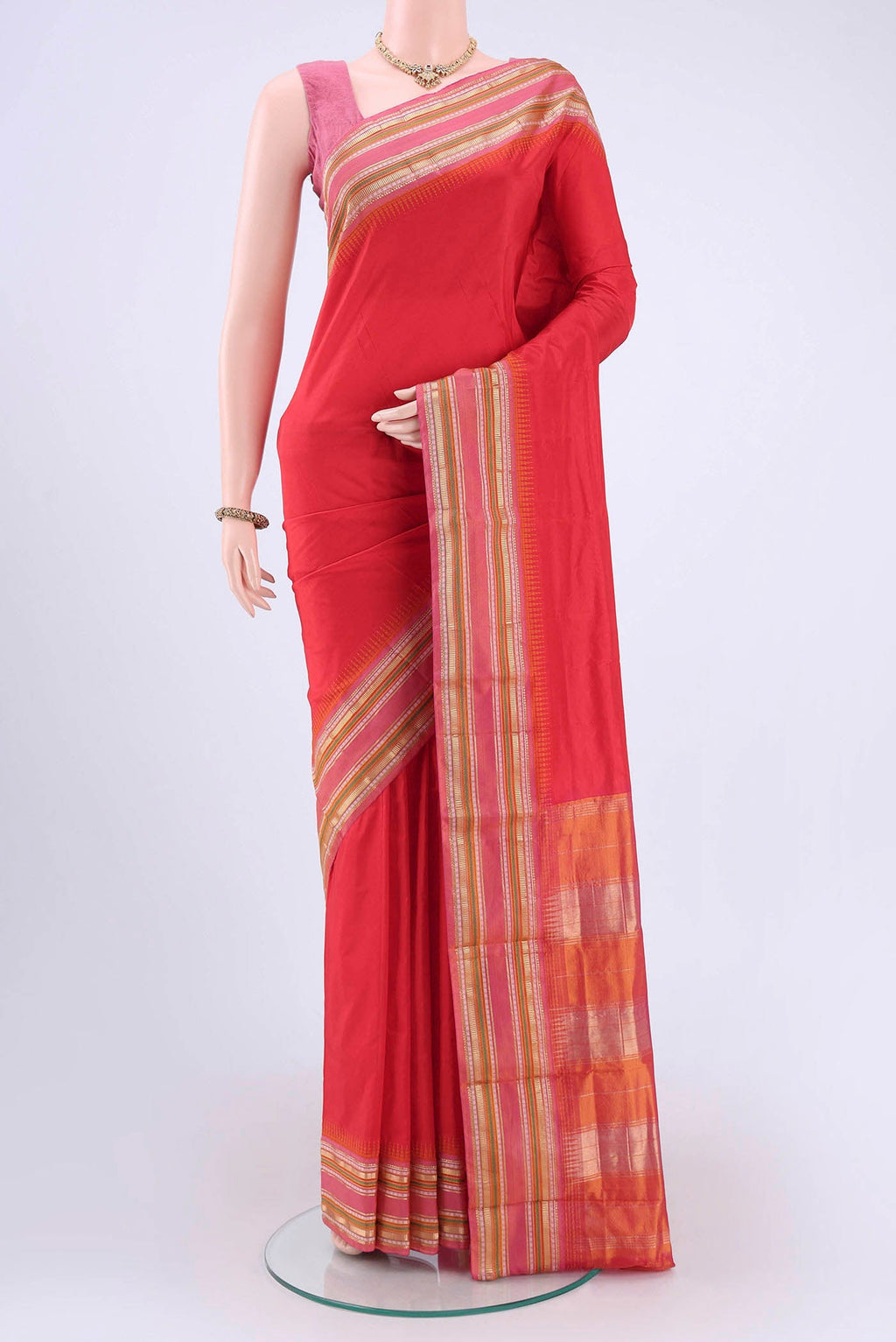 Red Bangalore Silk - kadyal Saree with Plain Body and Zari Border displayed on a mannequin