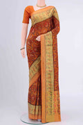 Rust Rajkot Patola Silk Saree with Pure Ikat on the body and Zari Border displayed on a mannequin