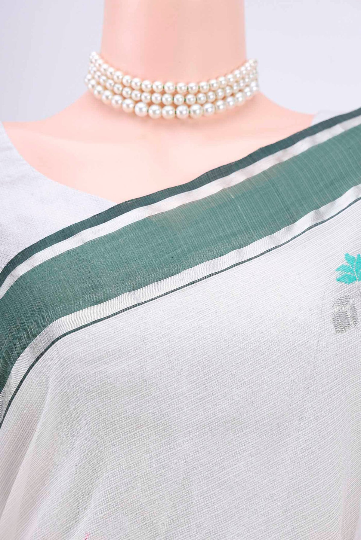 Border image of Pure Silk Pure Zari Off White Kota Cotton Saree with Zari And Thread Butta on the body and Zari Border. 