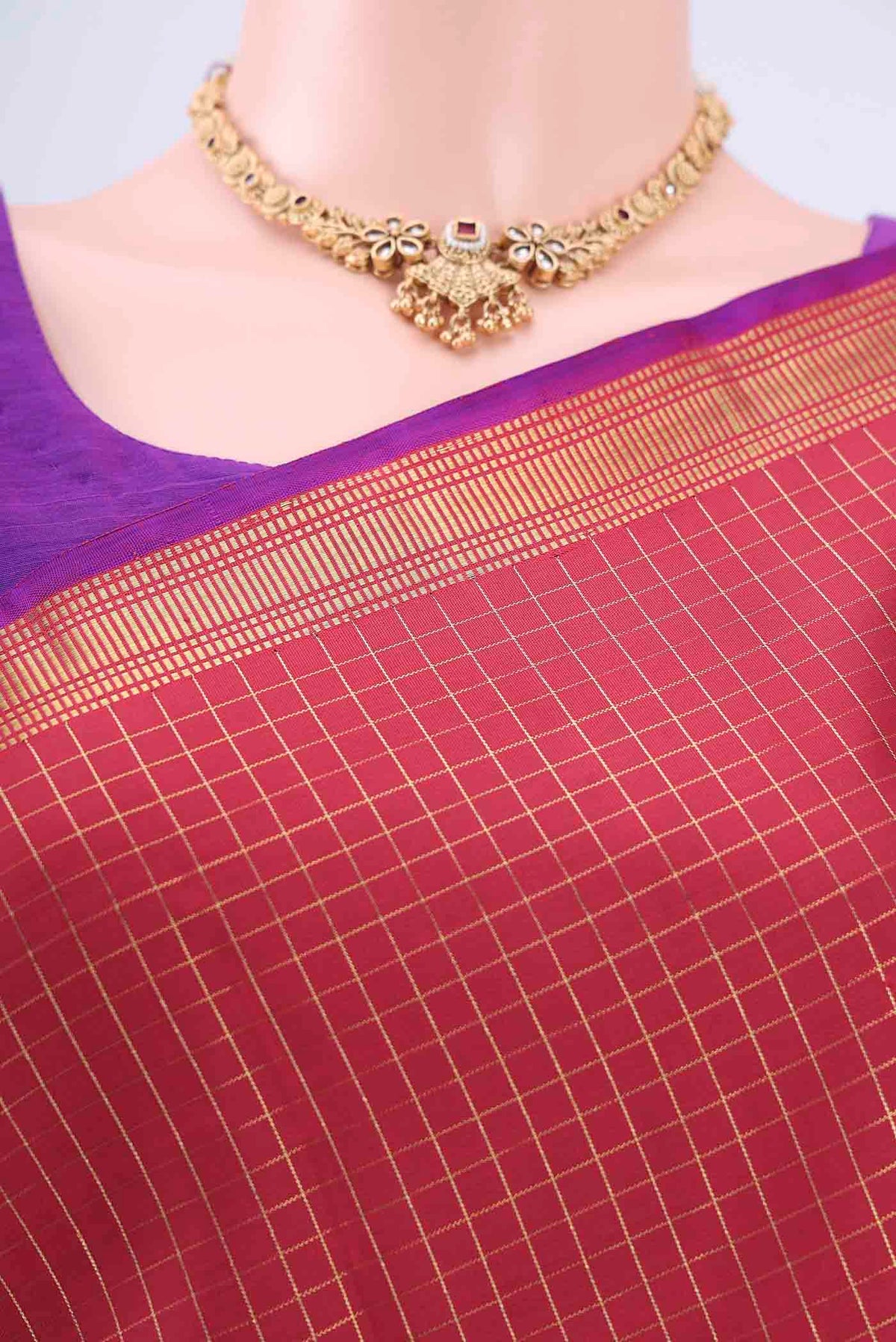 Border image of Maroon Kanchipuram Silk Saree with Checked design on the body and Temple Border
