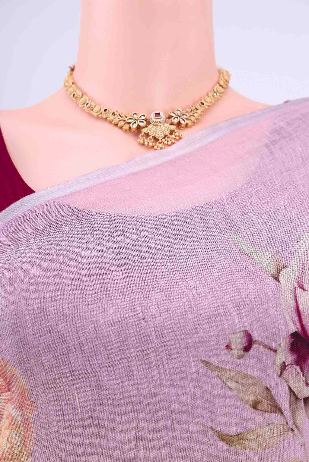 Border image of Lilac Linen Saree with Printed design on the body and Zari Border