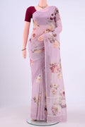Lilac Linen Saree with Printed design on the body and Zari Border displayed on a mannequin