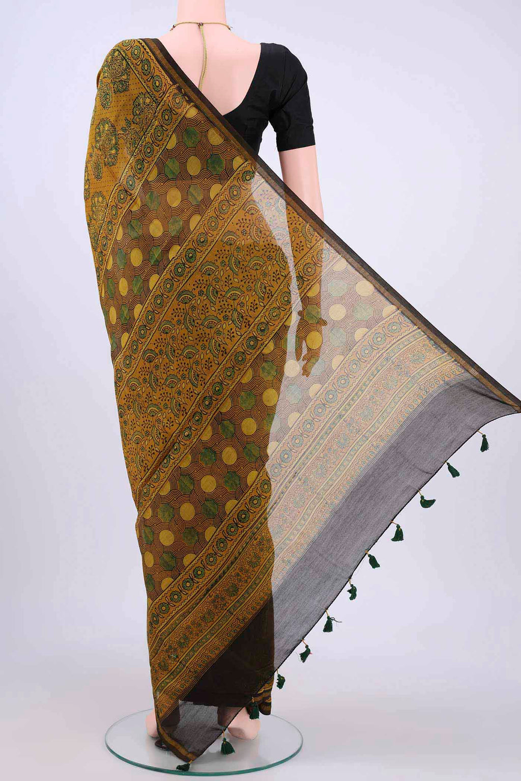Flat view of Mustard Cotton Saree with Printed design on the body and Zari Border