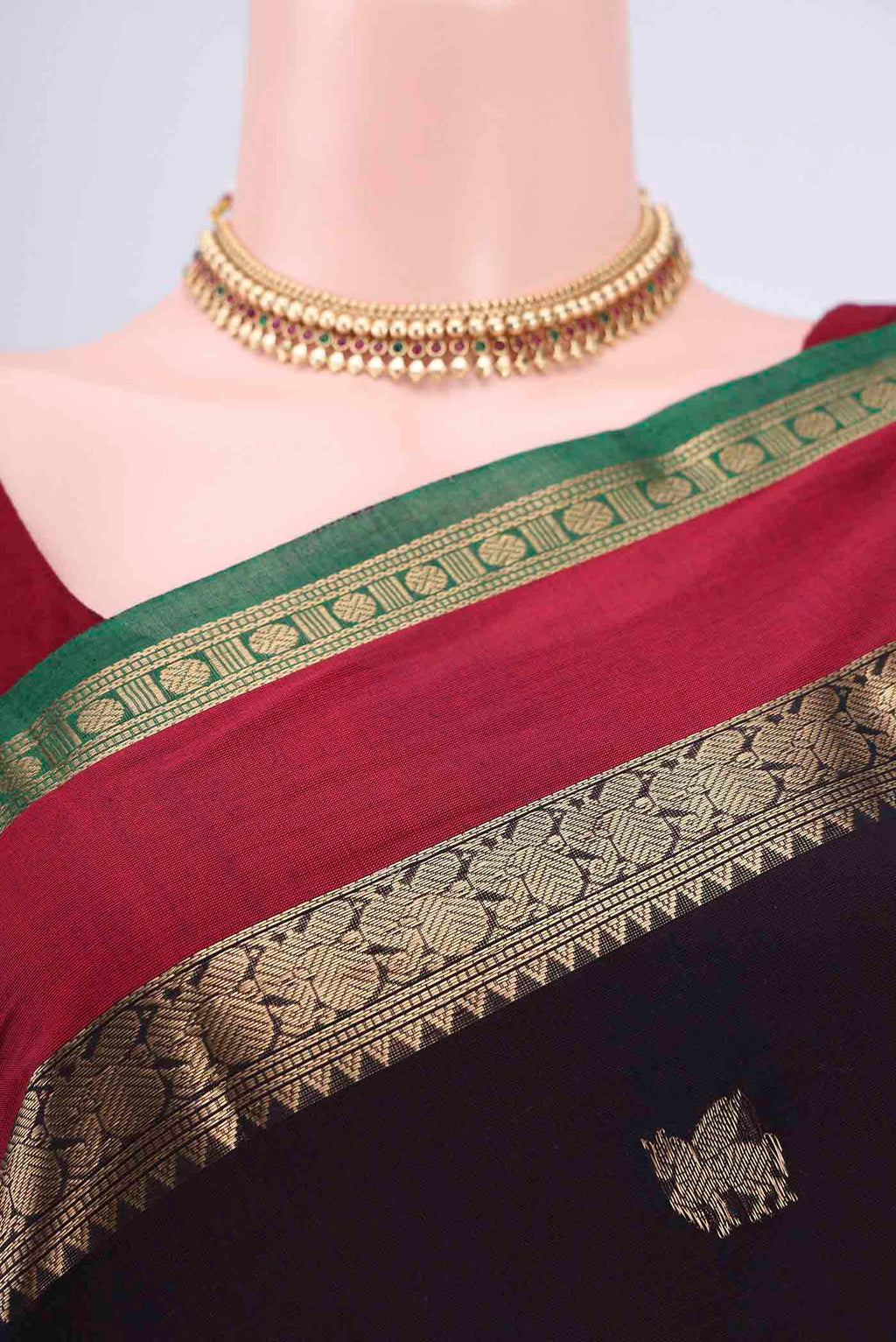 Border image of Black Kanchi Cotton Saree with Zari Butta on the body and Zari Border. 