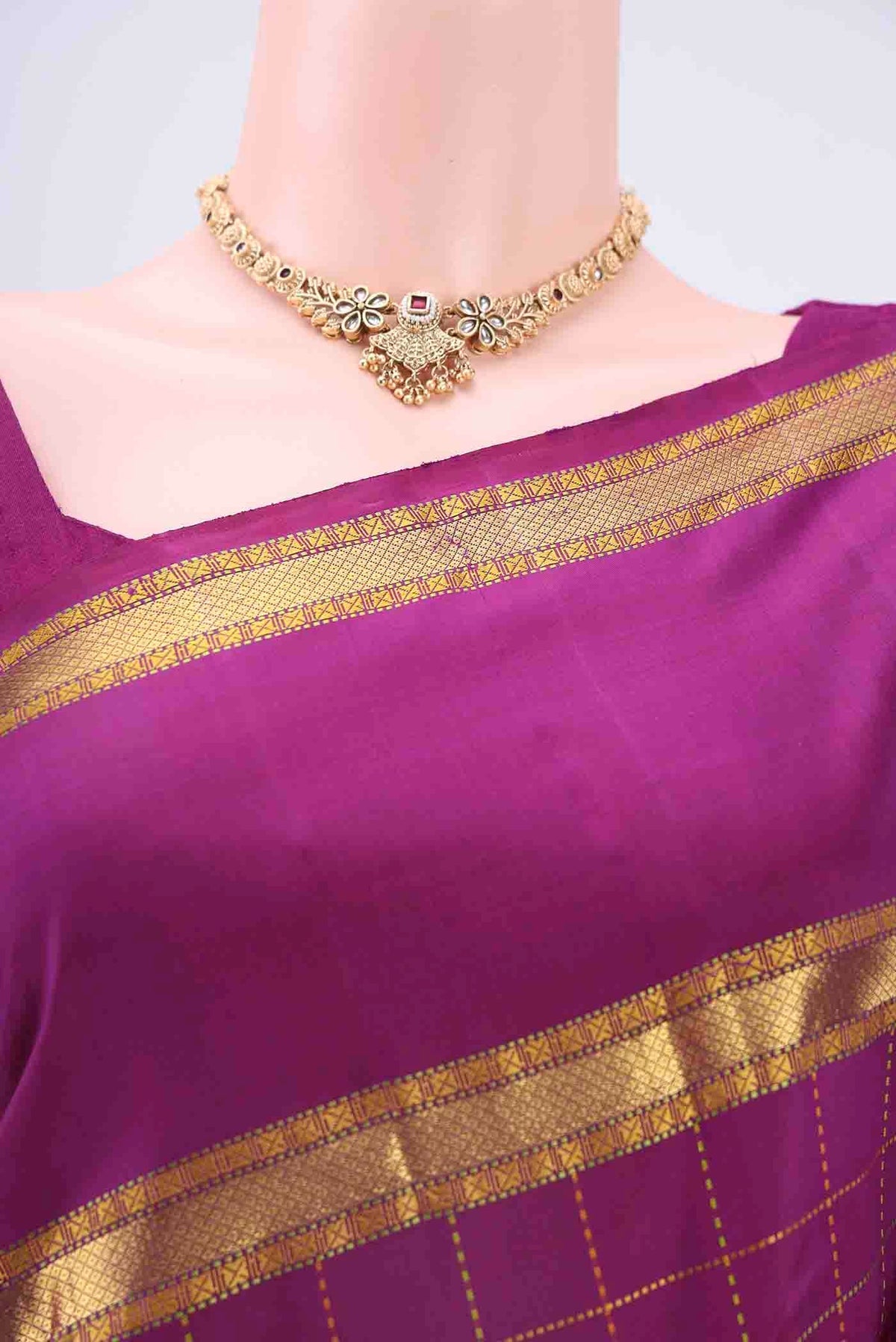 Border image of Magenta Kanchipuram Silk Saree with Checked design on the body and Zari Border