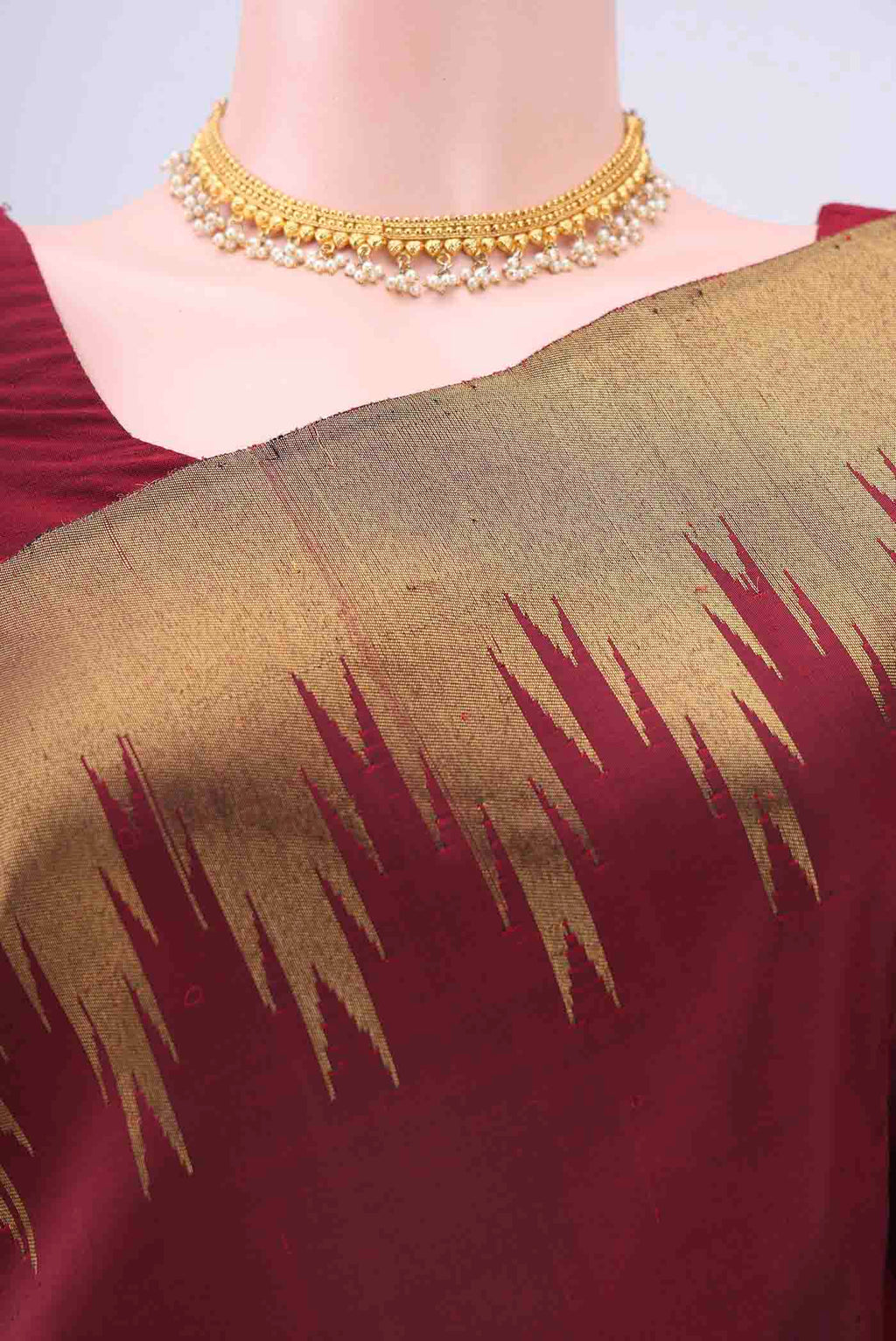 Border image of Pure Silk Pure Zari Maroon Kanchipuram Saree with Plain Body and Temple Border