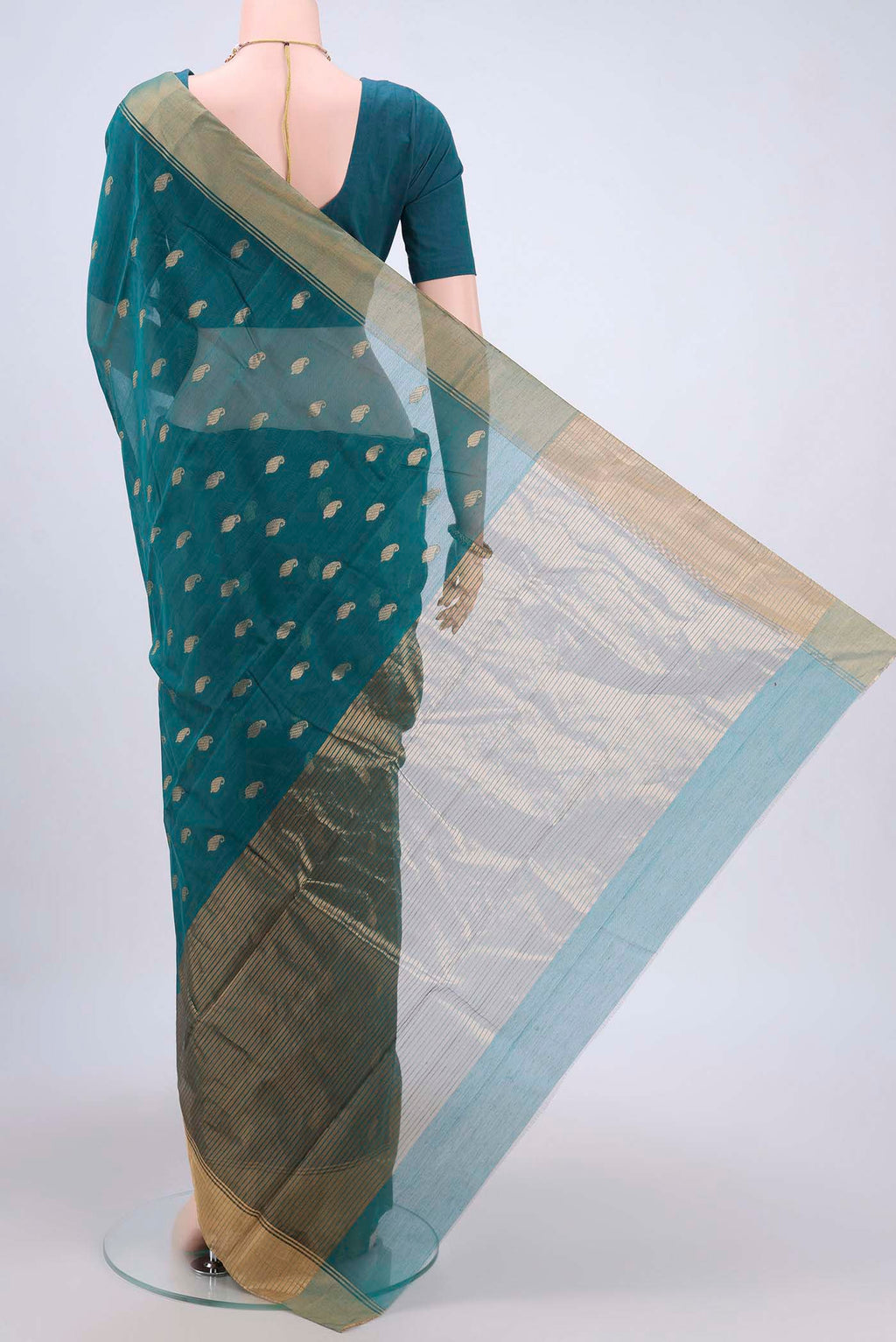 Flat view of Sea Green Chanderi Silk Saree with Zari Butta on the body and Zari Border. 