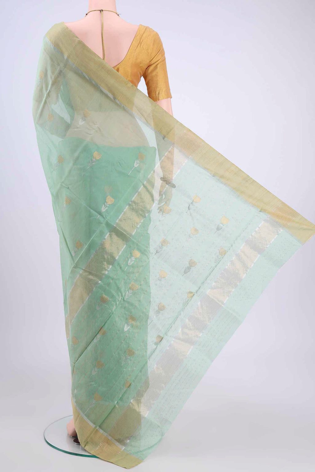 Flat view of Light Green Chanderi Silk Saree with Zari Butta on the body and Zari Border