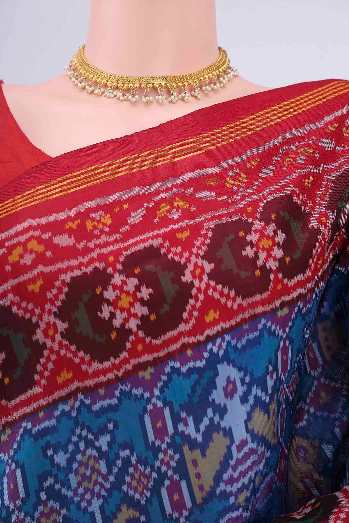 Border image of Blue Pochampally Silk Saree with Ikat design on the body and Zari Border