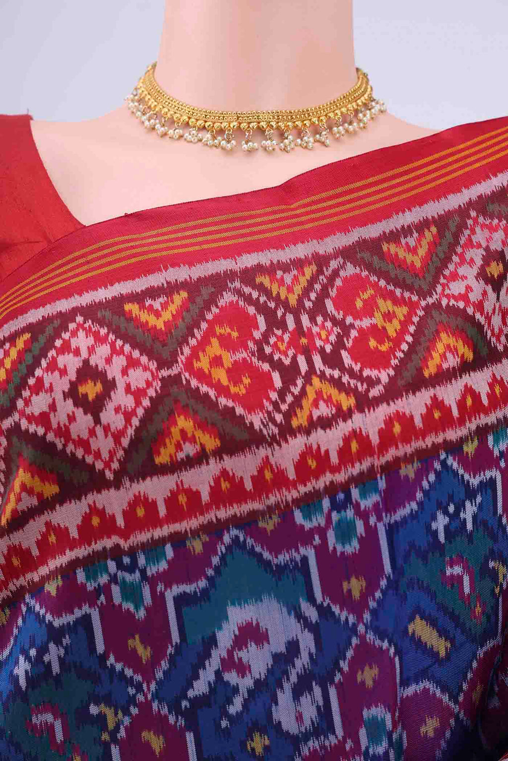 Border image of Blue Pochampally Silk Saree with Ikat design on the body and Zari Border