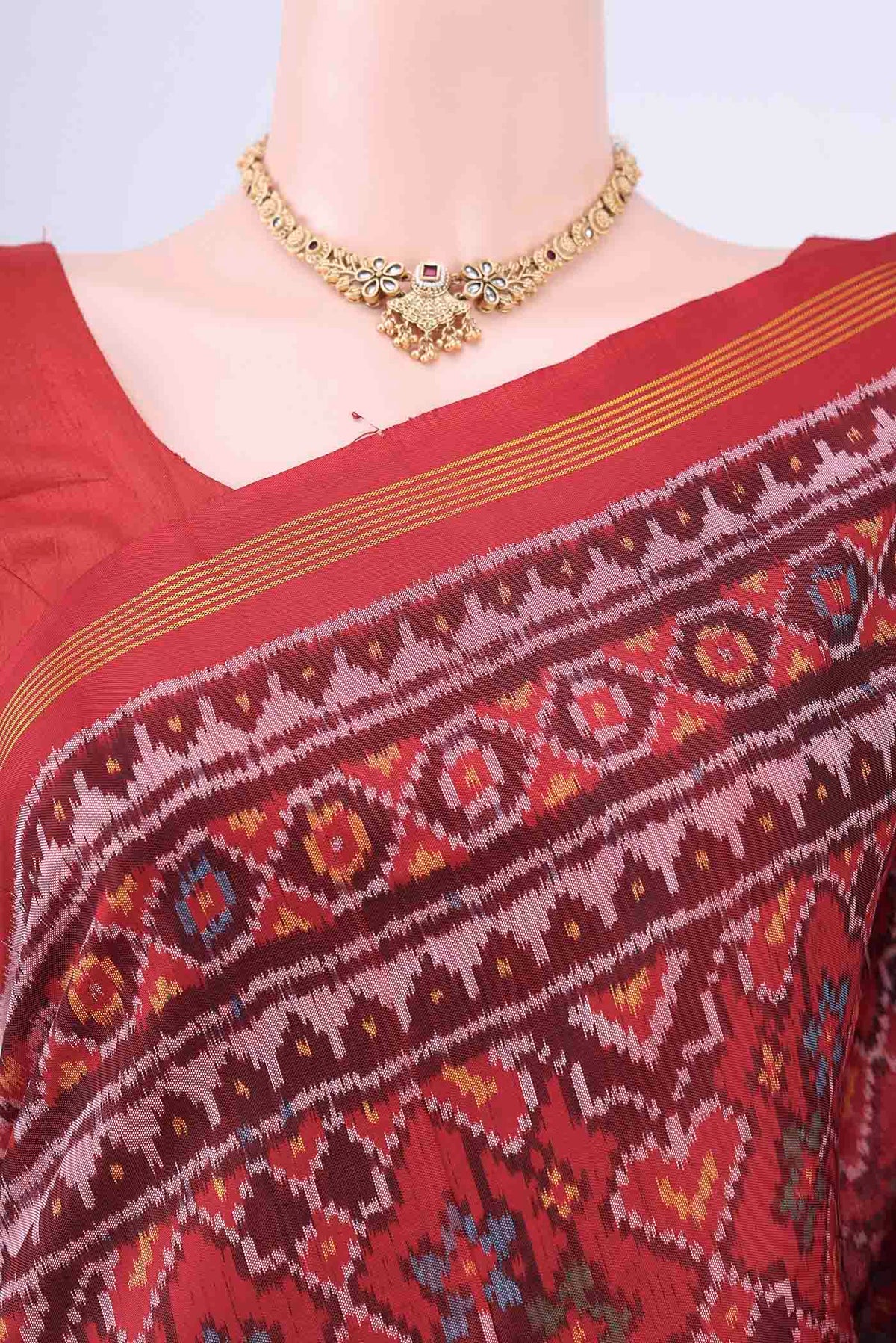 Border image of Red Rajkot Patola Silk Saree with Ikat design on the body and Zari Border