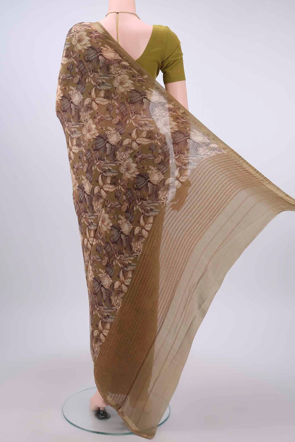 Flat view of Mehandi Green Mysore Crepe Saree with Printed design on the body and Zari Border