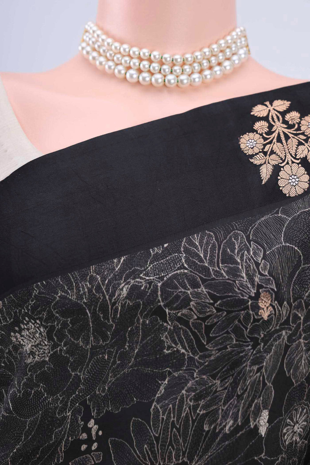 Border image of Black Printed Silk Saree with Floral Print on the body and Zari Border