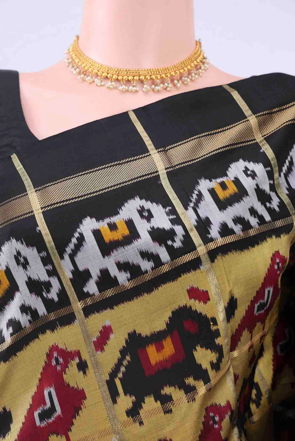Border image of Mehandi Green Pochampally Silk Saree with Checked design on the body and Zari Border