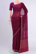 Magenta Mysore Crepe Saree with Floral Print on the body and Printed Border displayed on a mannequin