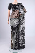Black Mysore Chiffon Saree with Zig Zag design on the body and Plain Border.  displayed on a mannequin