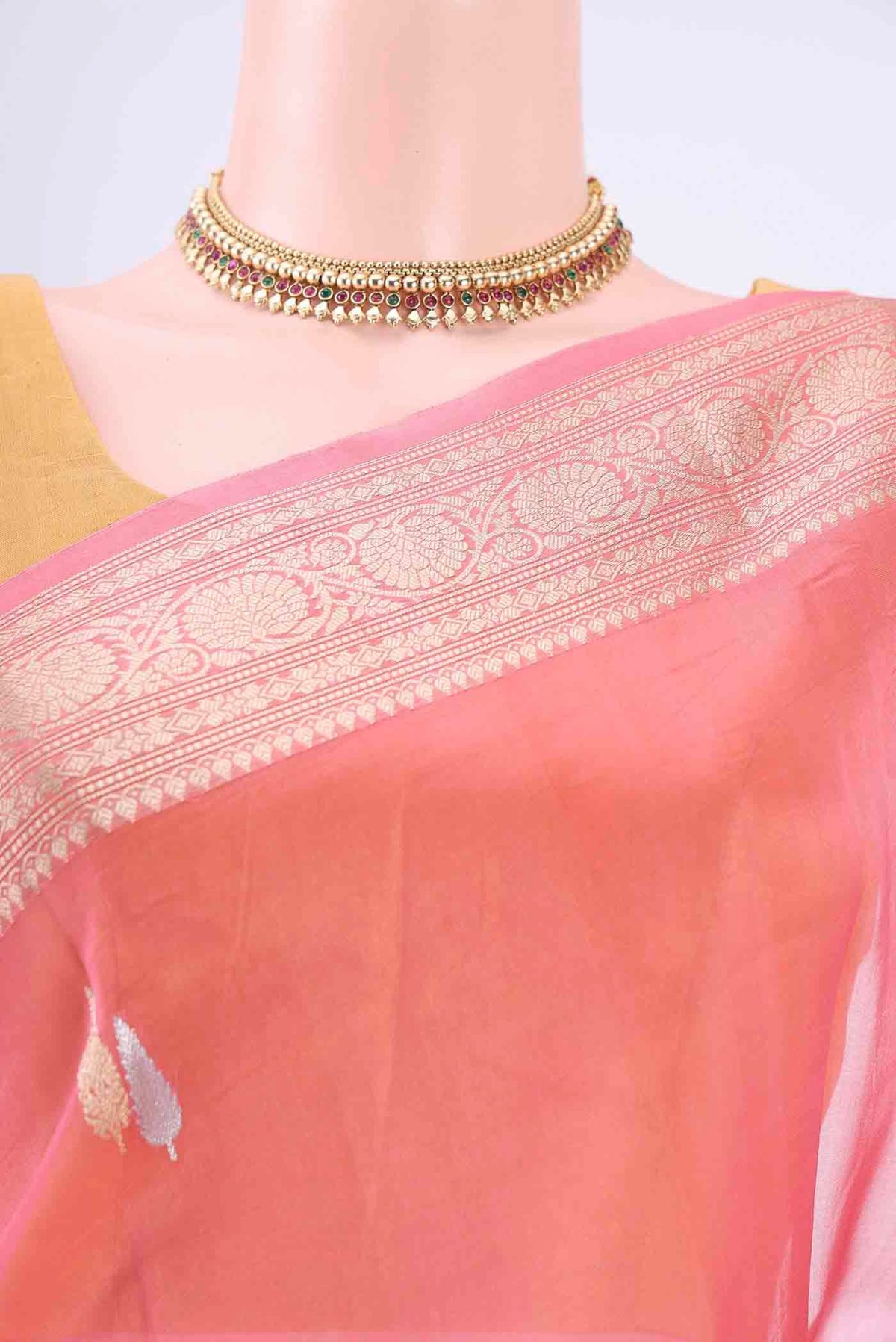 Border image of Rose pink Organza Silk Saree with Zari Butta on the body and Zari Border