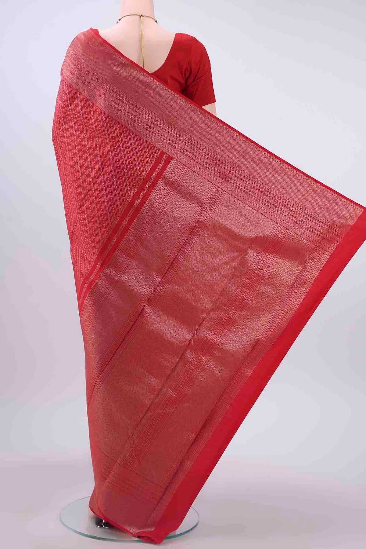 Flat view of Red Kanchipuram Silk Saree with Zari Brocade on the body and Zari Border