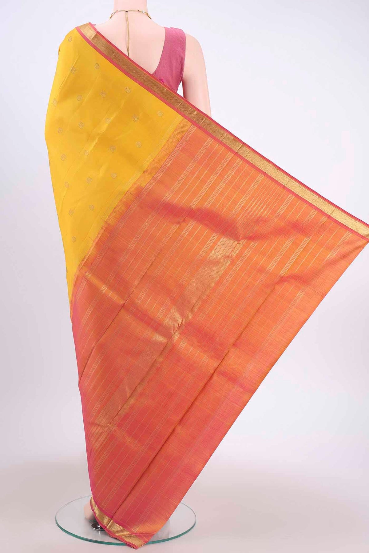 Flat view of Pure Silk Pure Zari Yellow Kanchipuram Saree with Zari Butta on the body and Zari Border