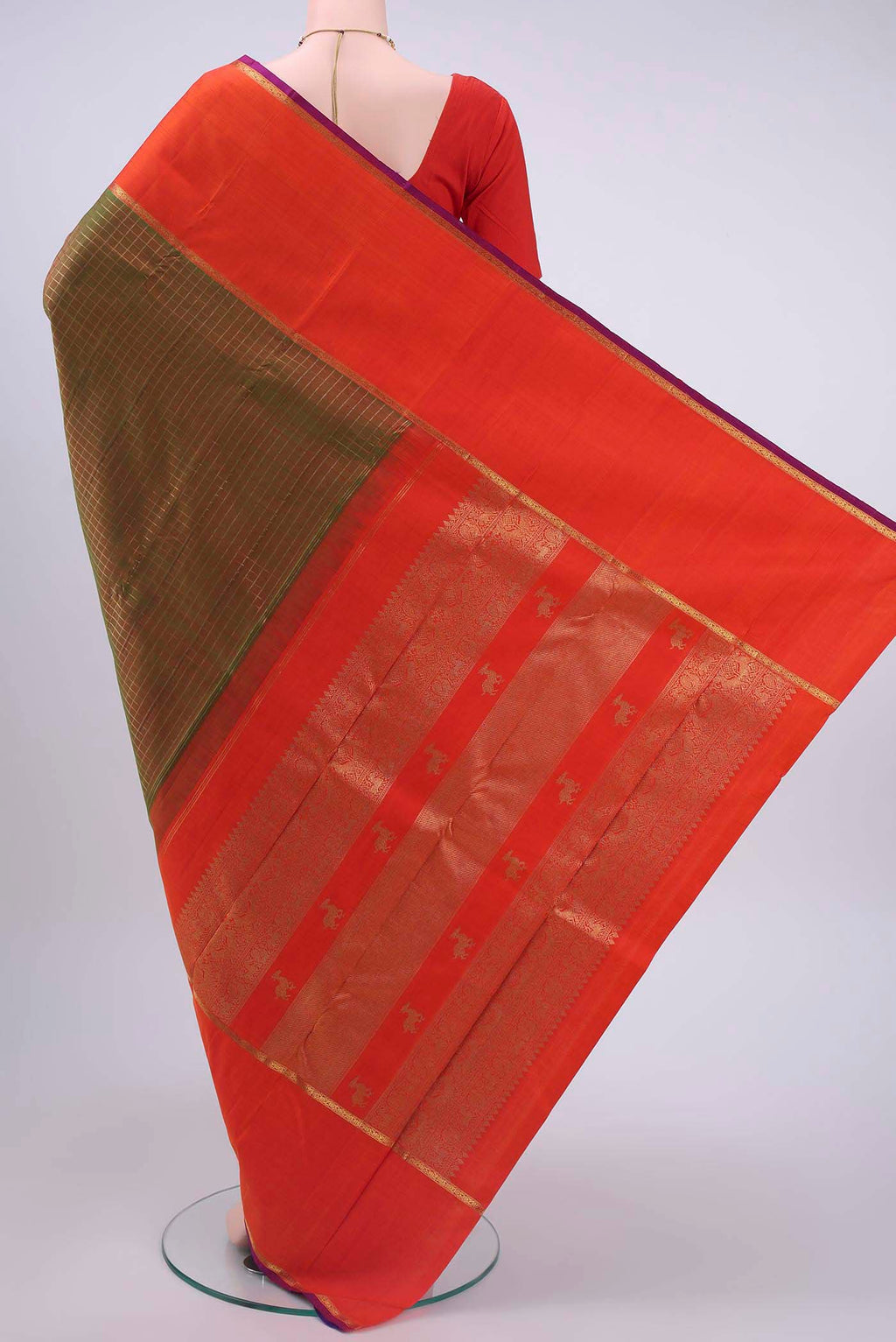Flat view of Pure Silk Pure Zari Green Kanchipuram Saree with Checked design on the body and Zari Border