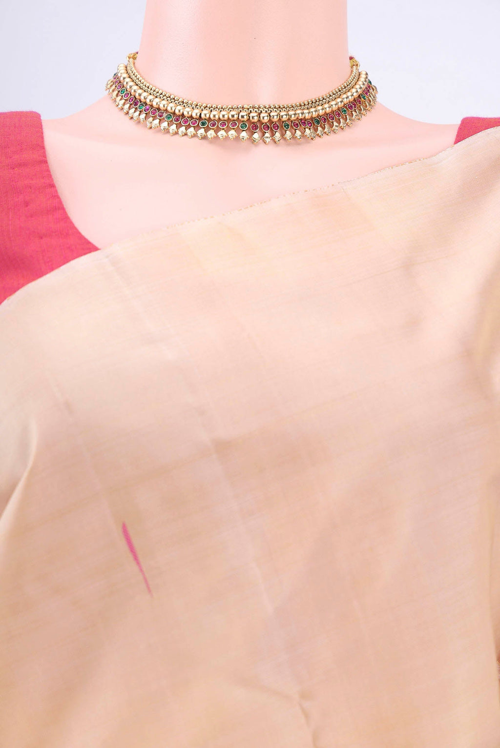 Border image of Beige Kanchipuram Silk Saree with Thread Butta on the body and Without Border