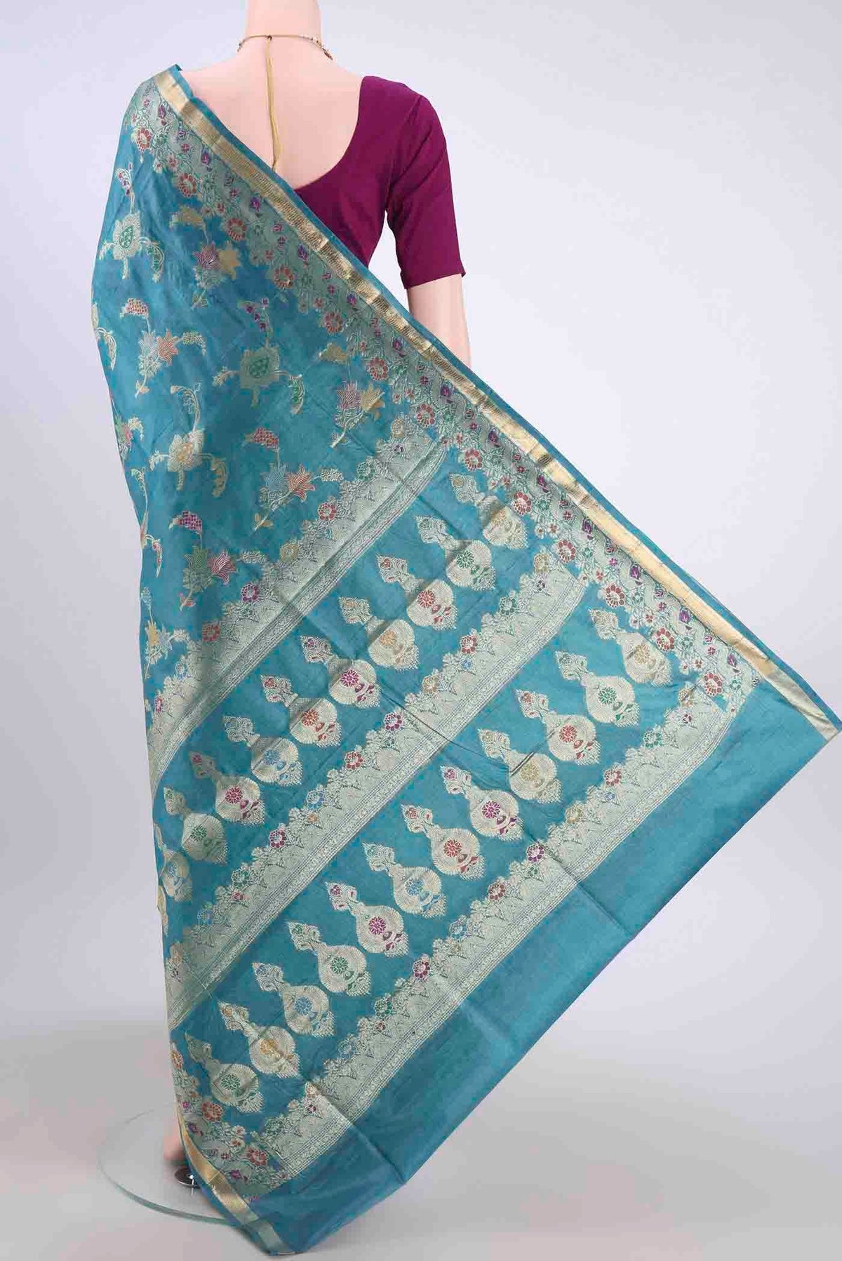 Flat view of Blue Banarasi Tussar Silk Saree with Zari And Thread Butta on the body and Zari And Thread Border