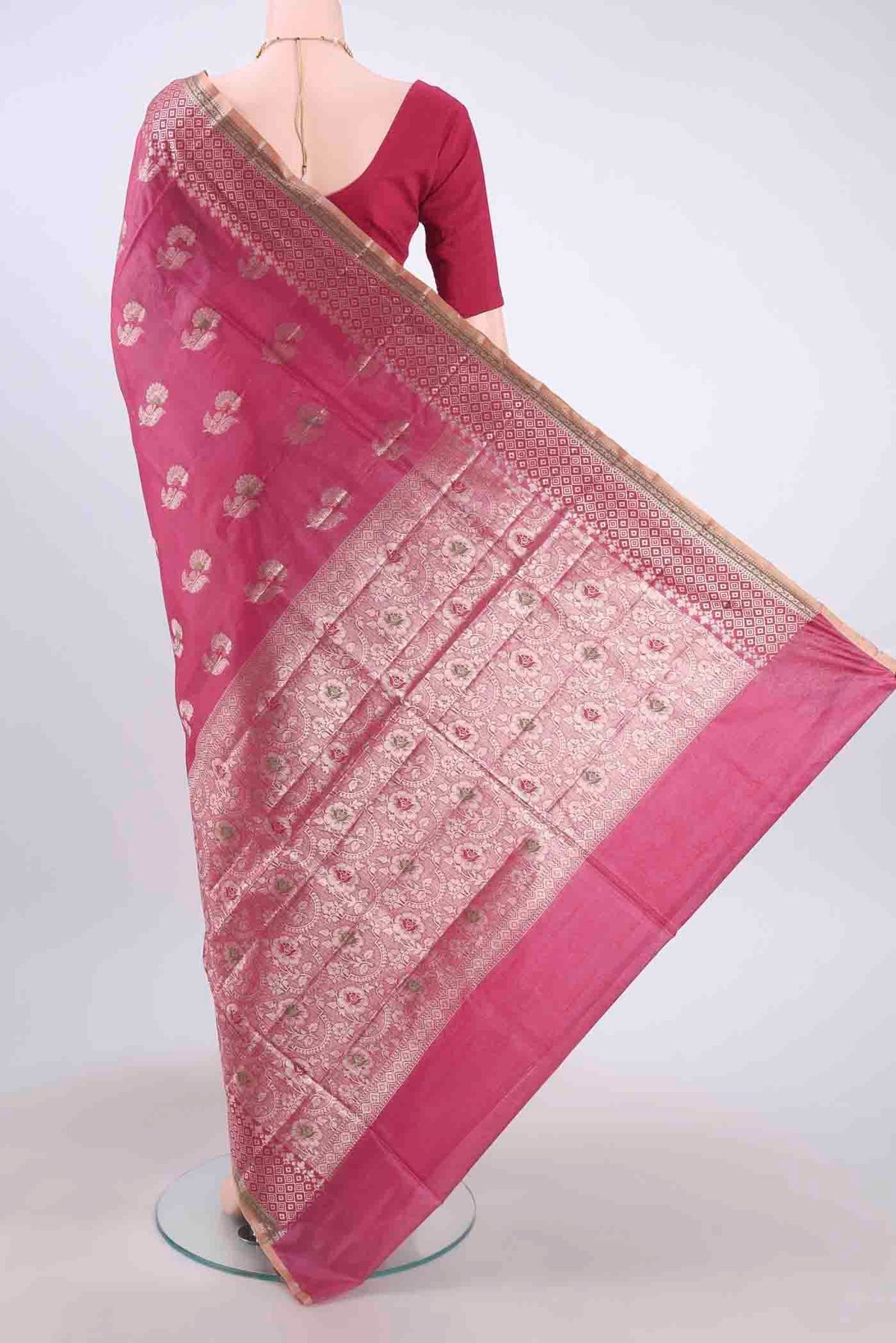 Flat view of Pink Banarasi Tussar Silk Saree with Zari Butta on the body and Zari And Thread Border