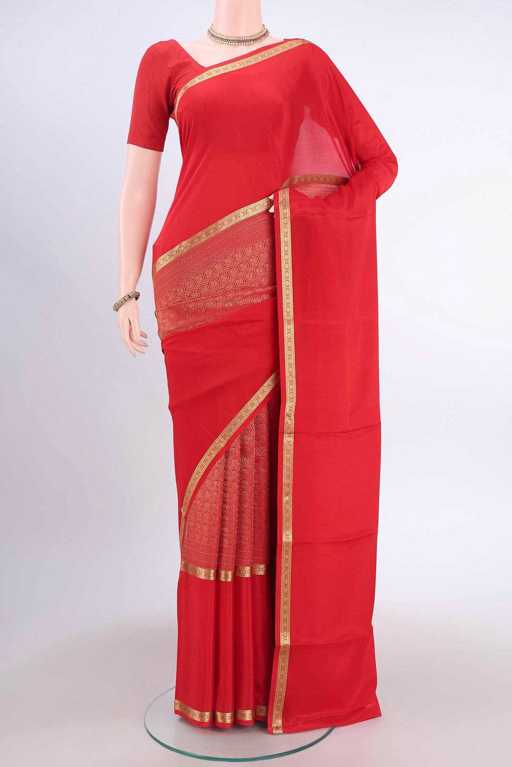 Red Mysore Crepe Saree with Jacquard design on the body and Zari Border displayed on a mannequin