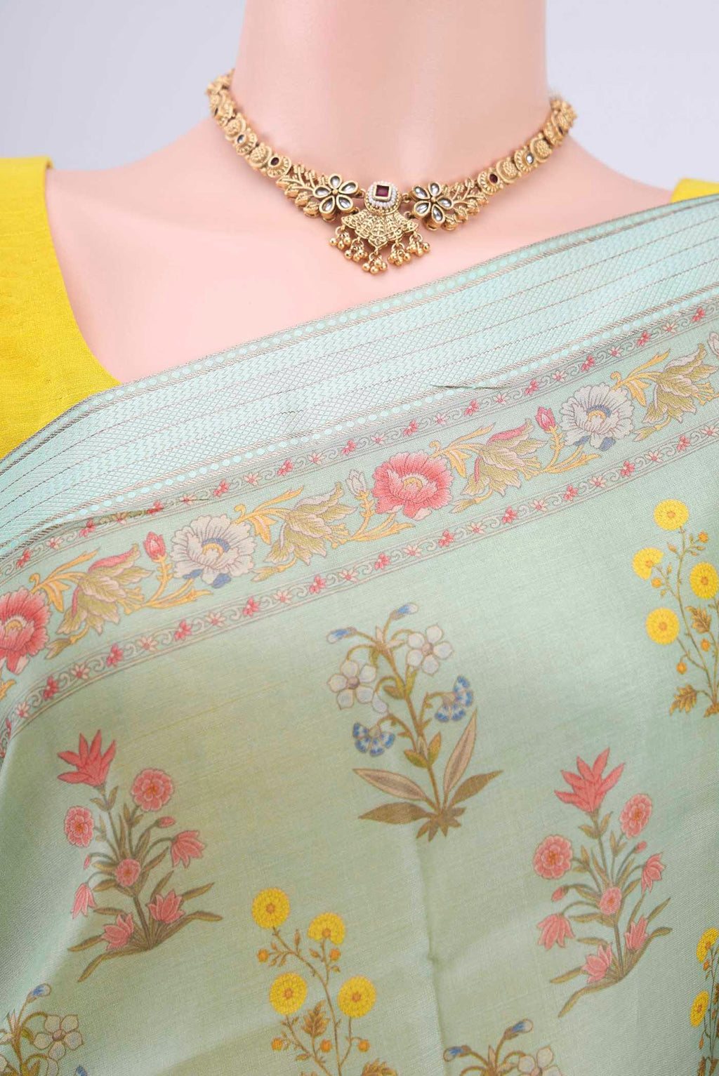 Border image of Mint Green Tussar Silk Saree with Floral Print on the body and Zari And Thread Border