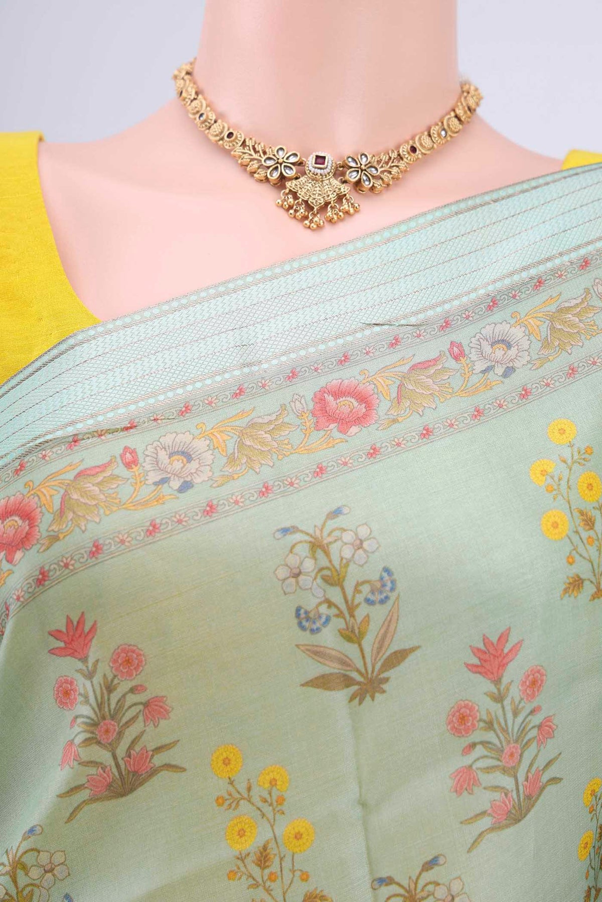 Border image of Mint Green Tussar Silk Saree with Floral Print on the body and Zari And Thread Border