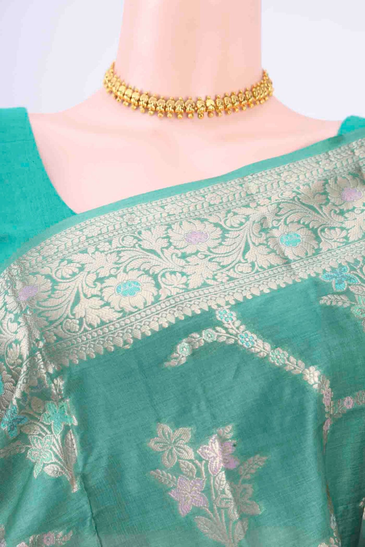 Border image of Maya Blue Banarasi Raw Silk Saree with Zari And Thread Butta on the body and Zari And Thread Border