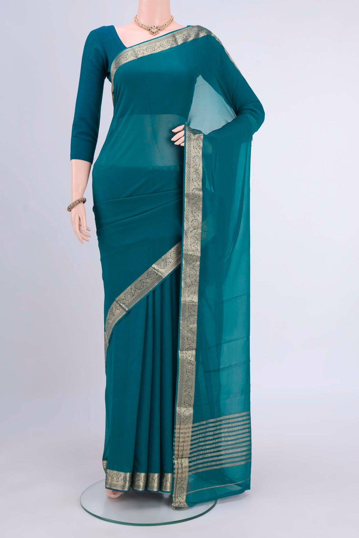 Blue Dual Tone Mysore Chiffon Saree with Plain Body and Zari Border displayed on a mannequin